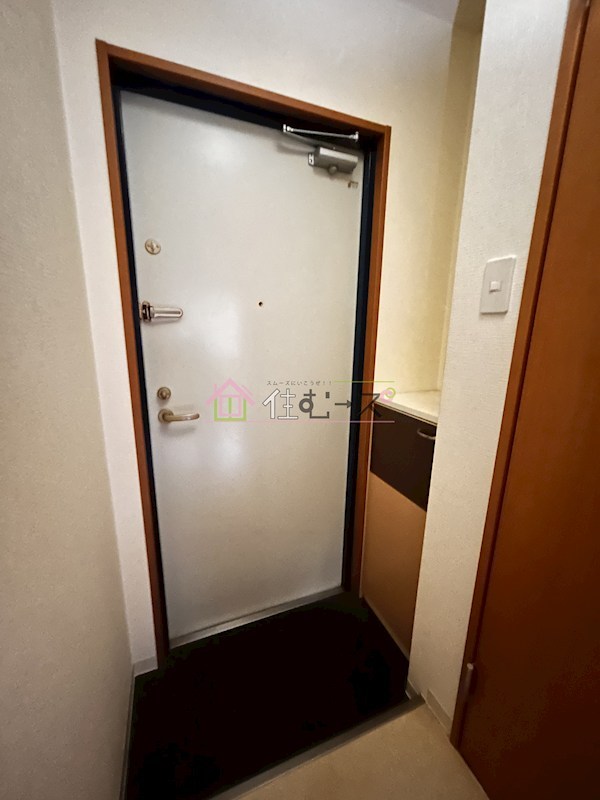 リズ新北野 玄関