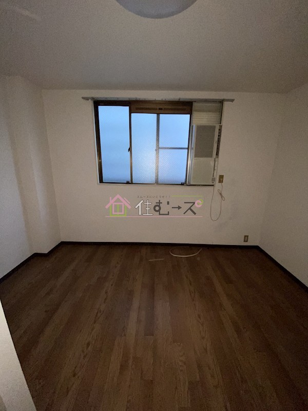 728湯里ハイツ ベッドルーム