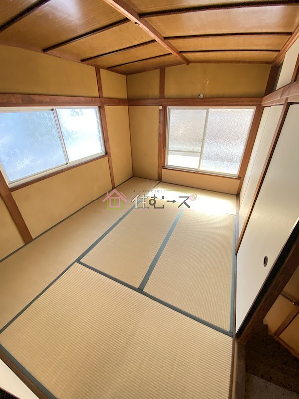 湯里1貸家 ベッドルーム