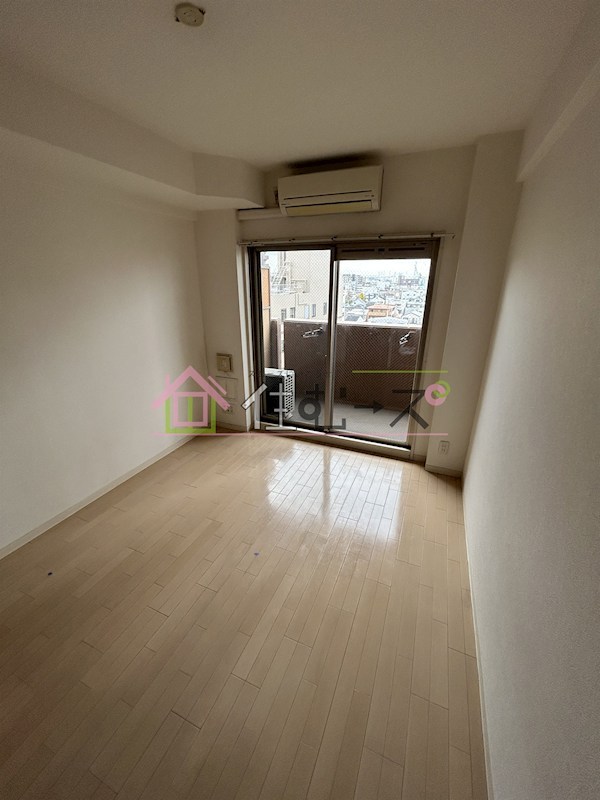 ライジングコート岸里玉出駅前 ベッドルーム