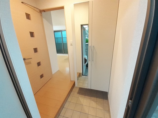 エレガント塚崎 玄関