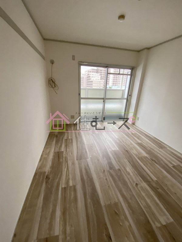 メゾンかせの ベッドルーム