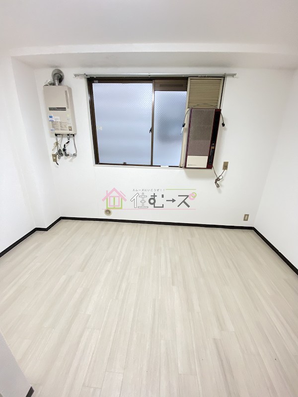 728湯里ハイツ ベッドルーム