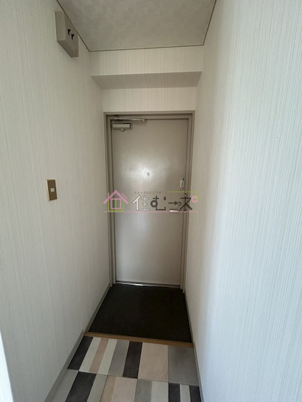 メゾンド平野北 玄関