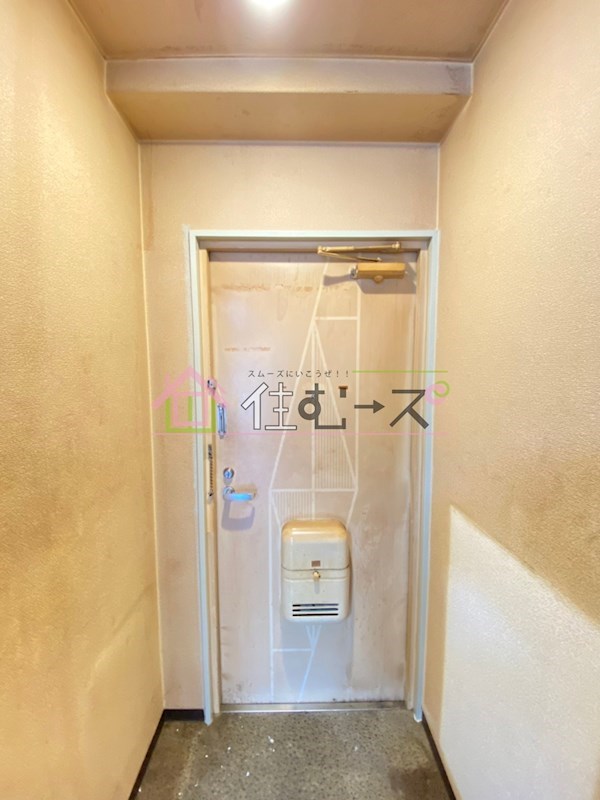 エスタイル塚本 玄関