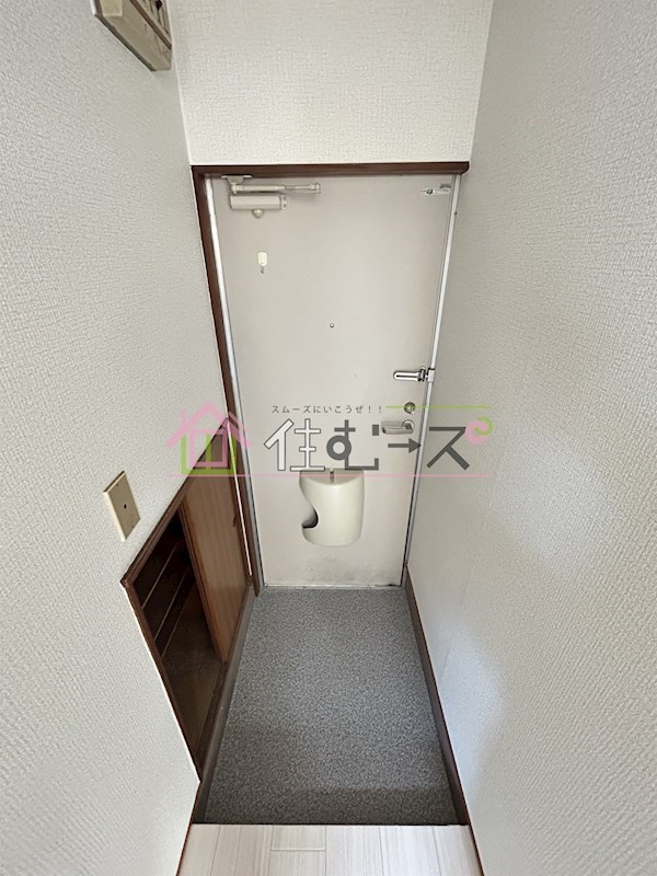 KANESHIRO豊里マンション 玄関