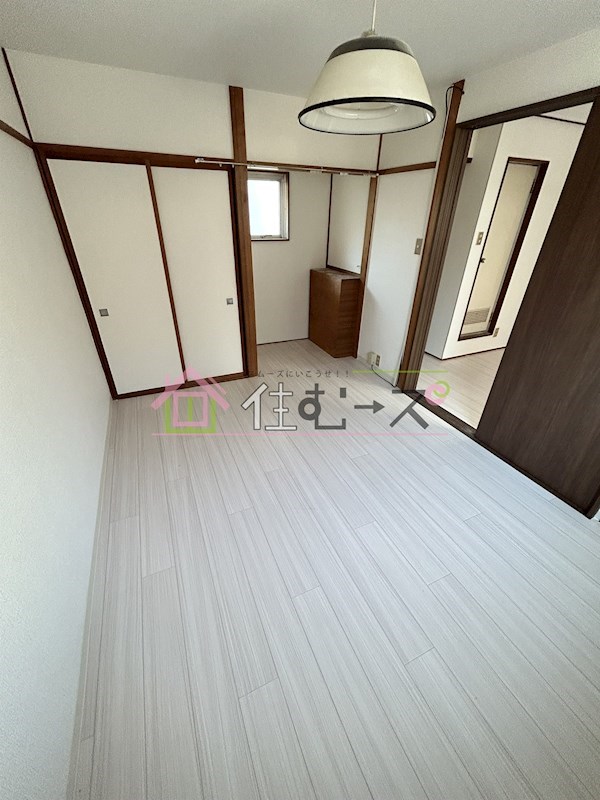 KANESHIRO豊里マンション リビング