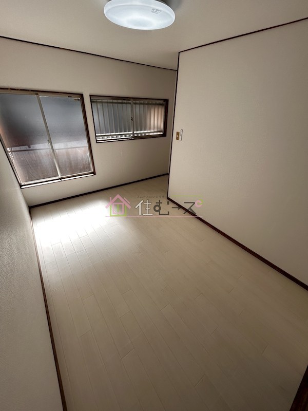 加美東6丁目テラスハウス ベッドルーム