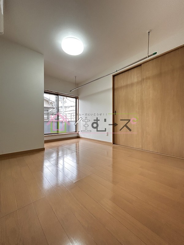 新高1丁目戸建 ベッドルーム