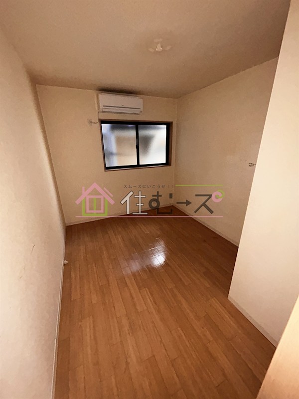 万代アパート ベッドルーム