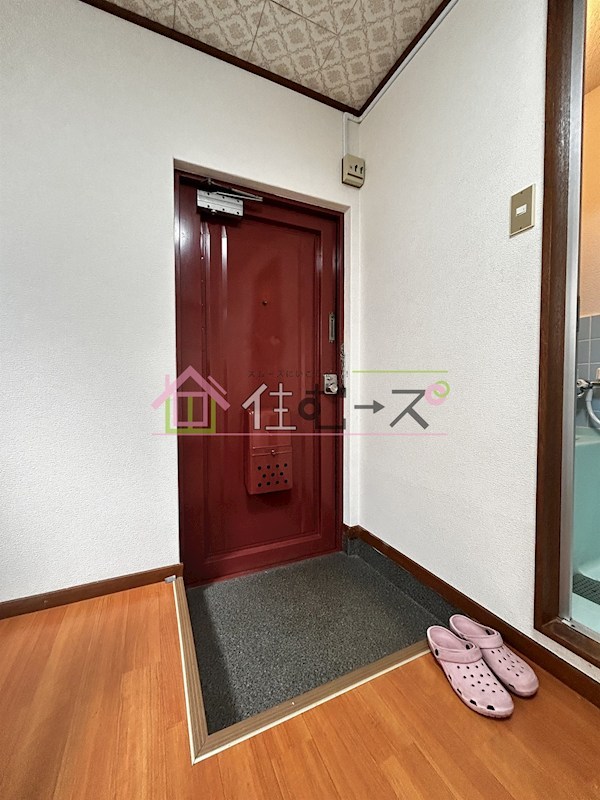 ライオンズ長峡 玄関