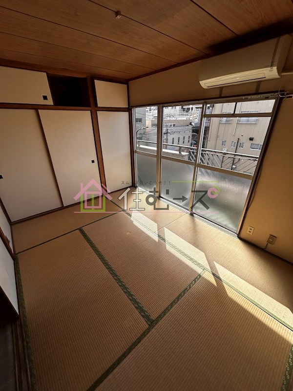 マンションエイタツ ベッドルーム