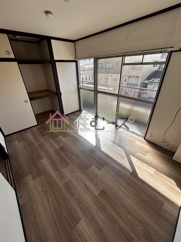 マンションエイタツ ベッドルーム