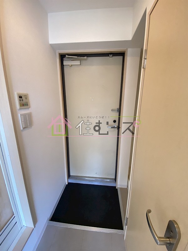 オーキッドコート天神橋 玄関