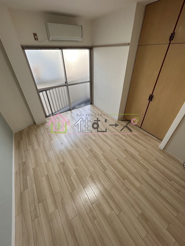 松崎マンション塚本 ベッドルーム