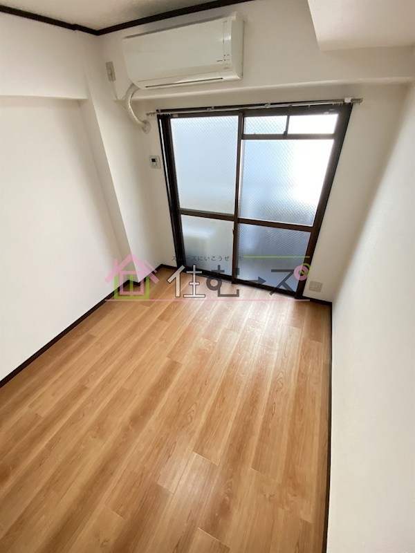 土井グランドマンション ベッドルーム