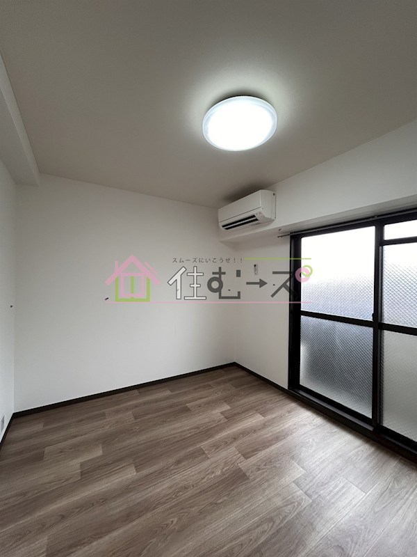 遠里小野4丁目ハイツ ベッドルーム