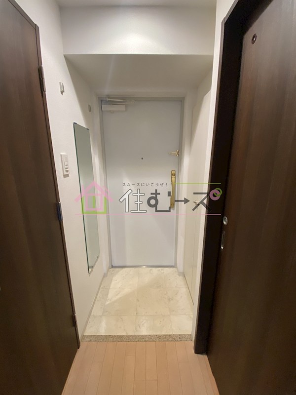 クリスタルエレガンスWEST 玄関