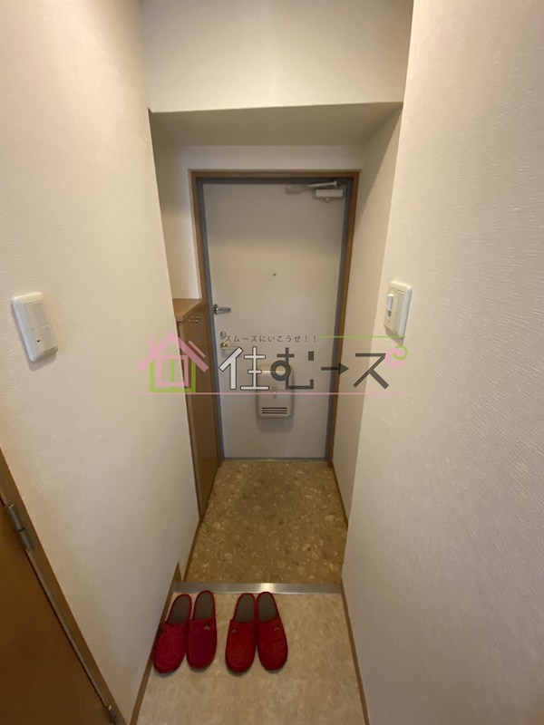 クイーンズコート 玄関