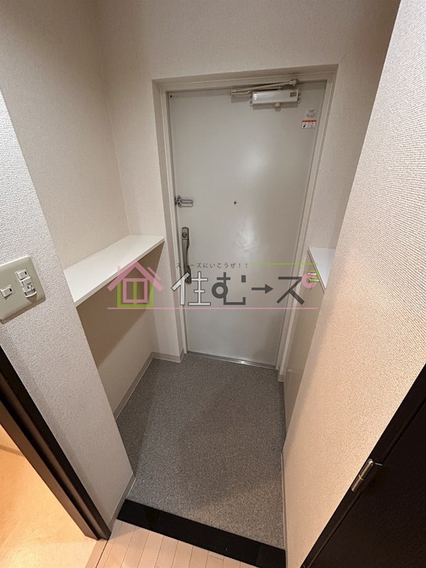 ウィスタリア新北野 玄関