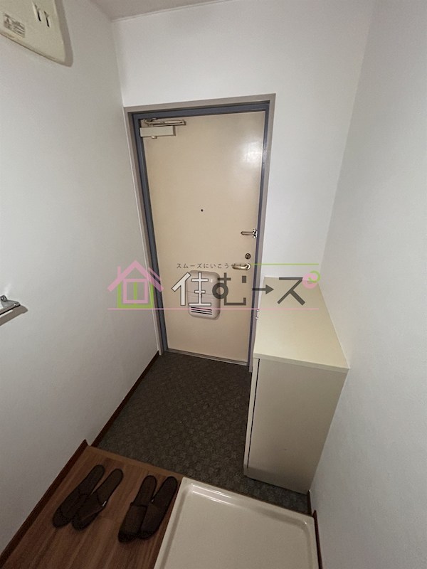 プレジデント豊新 玄関