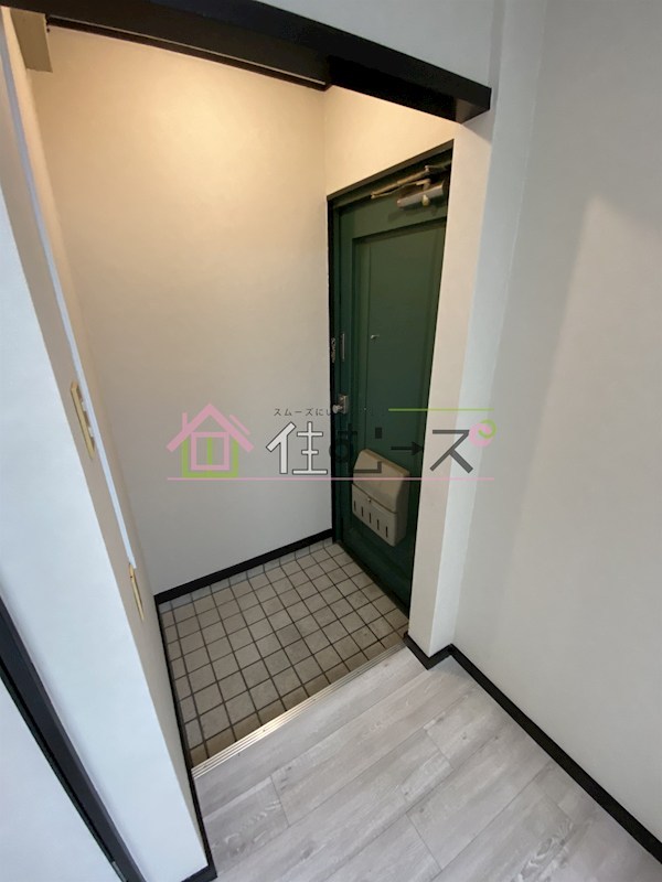 プレジール平野 玄関