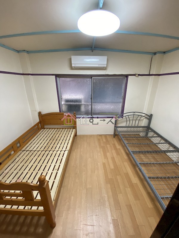 新今里マンション ベッドルーム