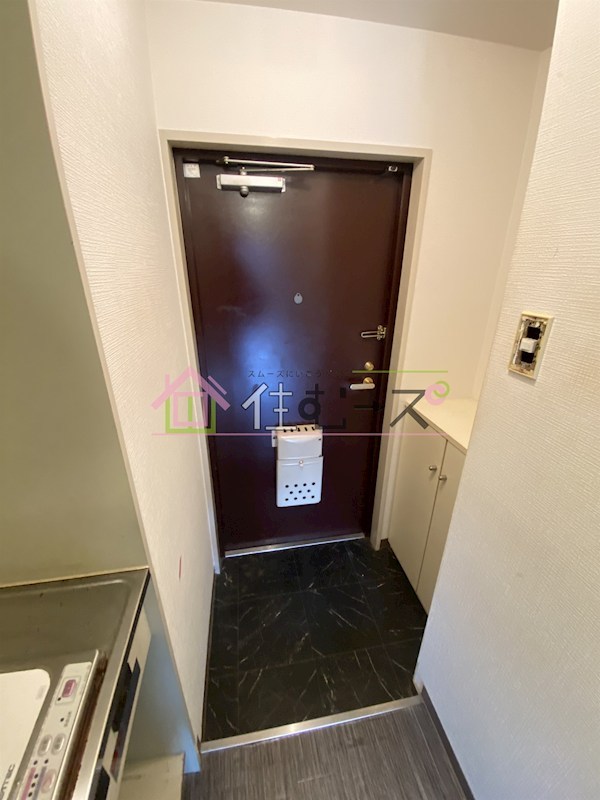 リアライズ西淡路 玄関