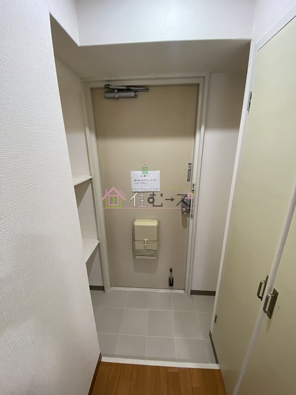 プレジデント横田 玄関