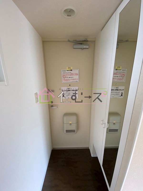プレジール靭公園 玄関