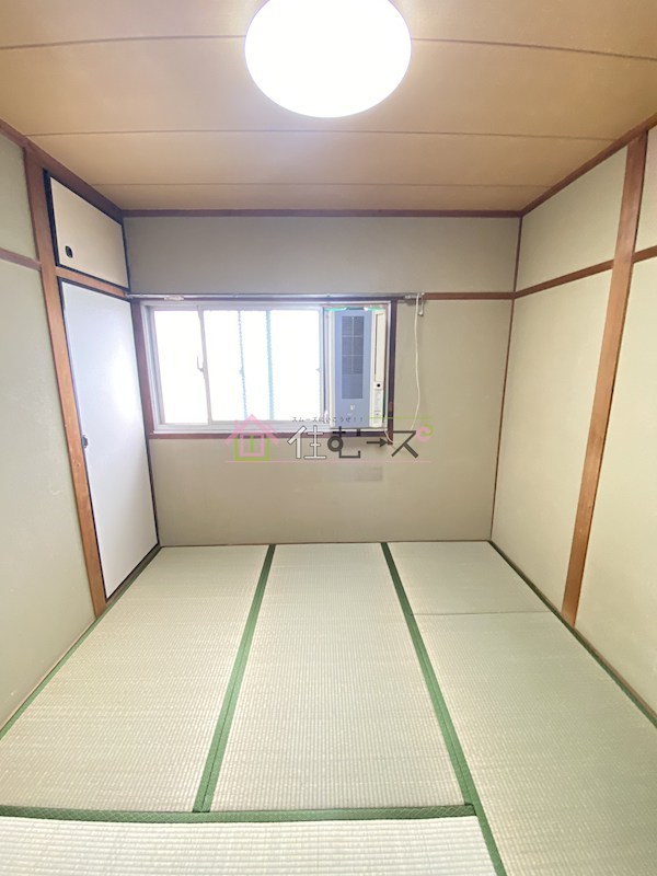 田中マンション ベッドルーム