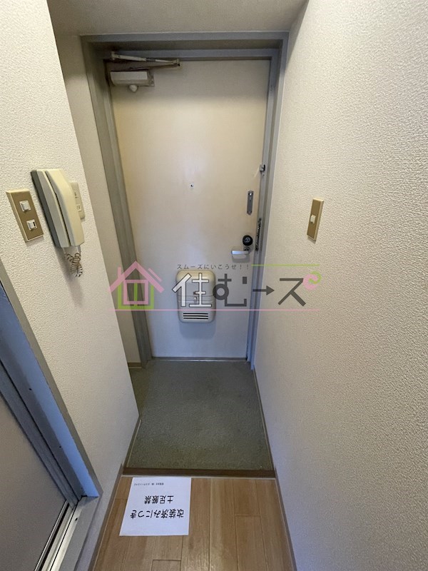 サクセス照ケ丘 玄関