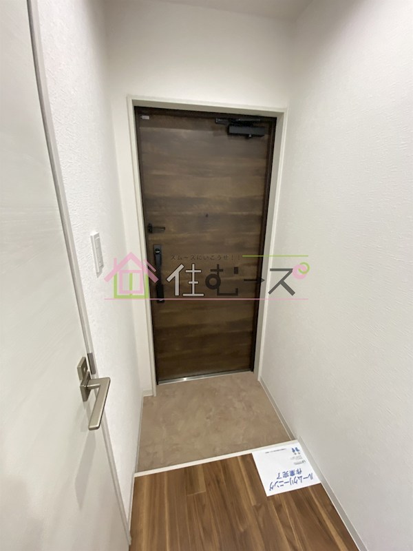 グランエスコート淀川 玄関