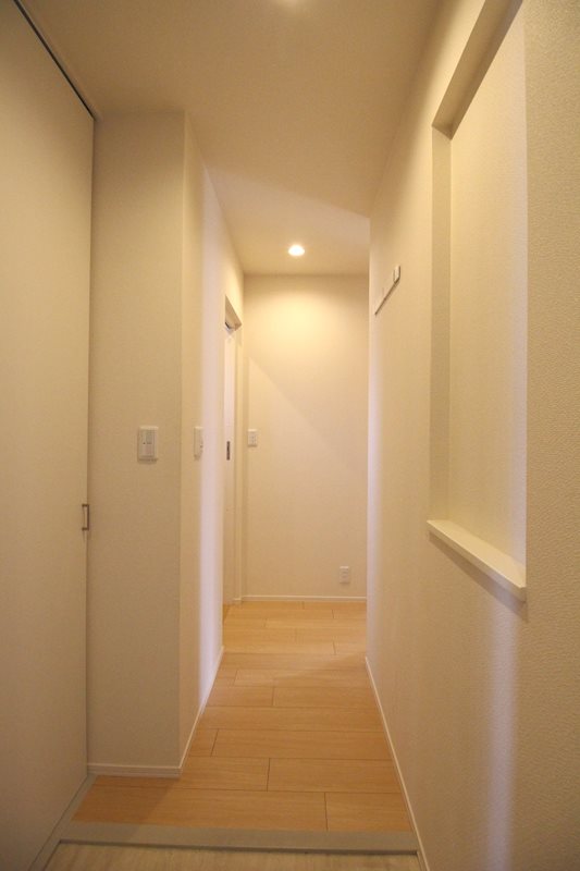 プルミエール梅里 玄関