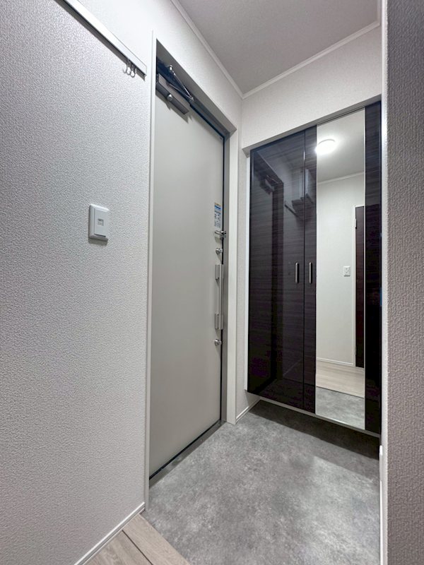 クレールムサシ 玄関