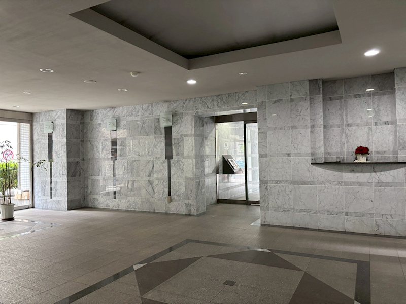 カルムインフォアームズ東京コア エントランス