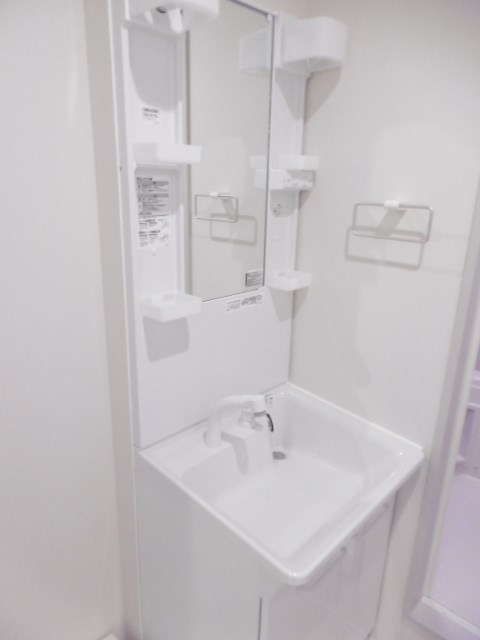 エスコート上末吉 玄関