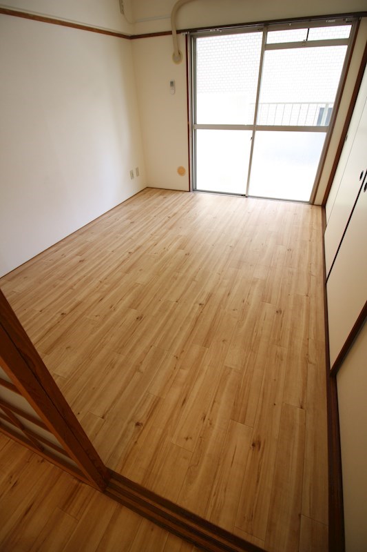 角田ビル片野新町 ベッドルーム