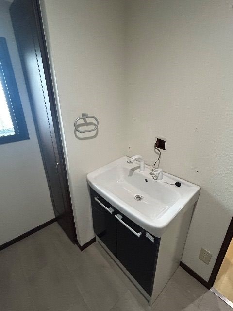 ニューリバー九工大駅前 洗面所