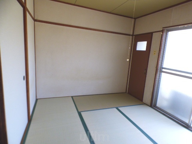 原田マンション ベッドルーム