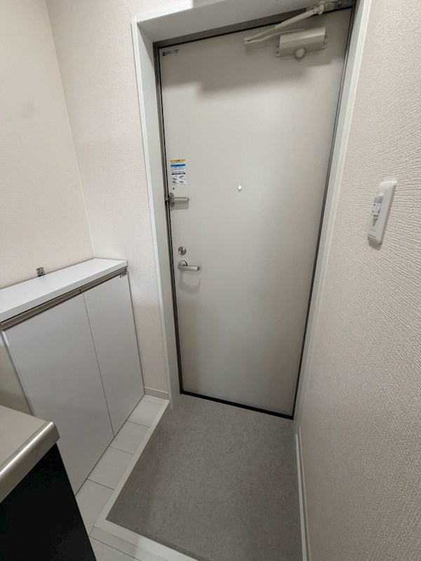グランシャレー千住旭町 玄関