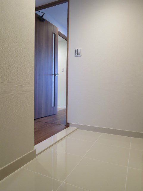 プレサンスジェネ丸の内 玄関