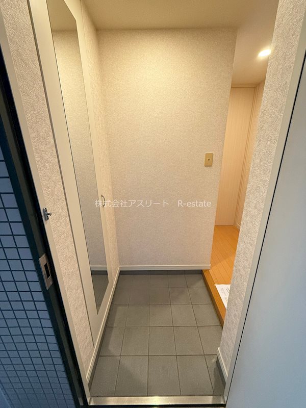 サヴォイテンジンクォーター 玄関