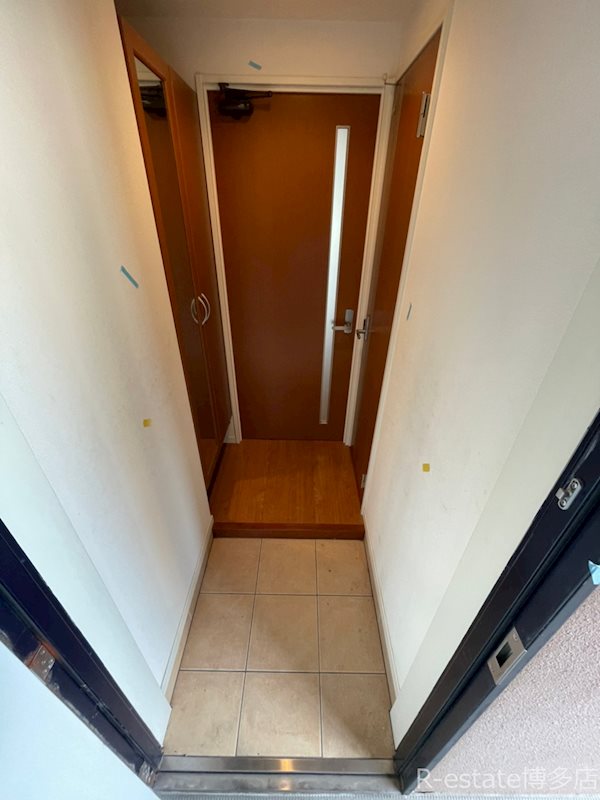 ニューガイアリルーム九大病院前 玄関