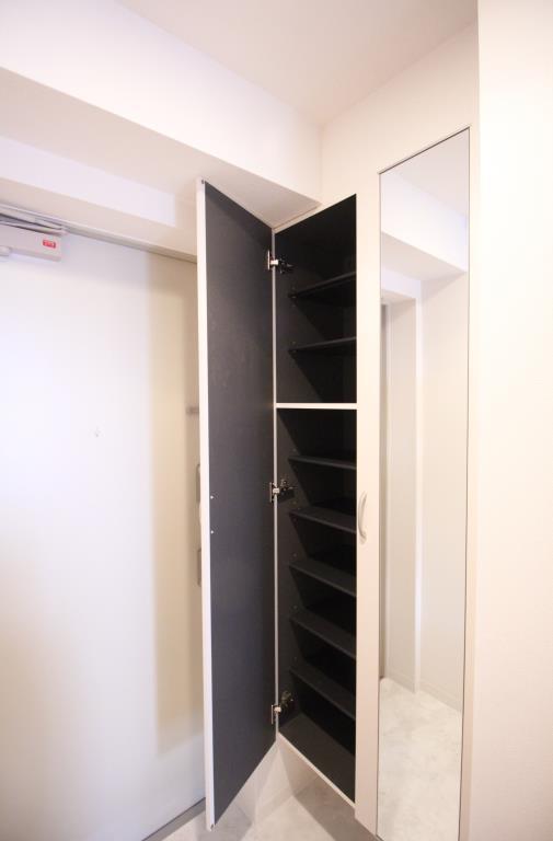 ル マノアール 玄関