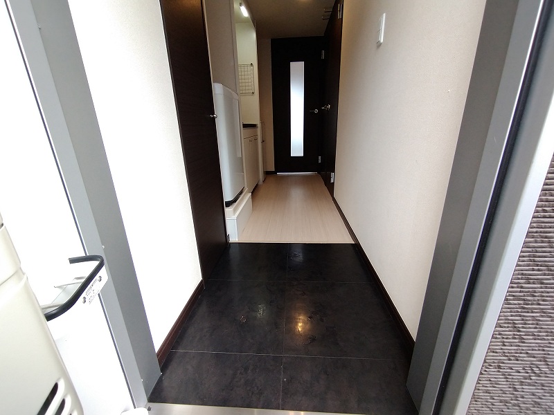 レオネクストラムールウールー 玄関