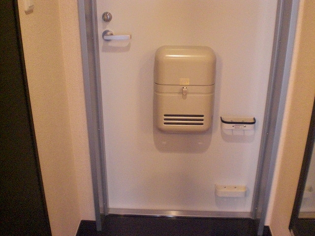 レオネクストたまき 玄関