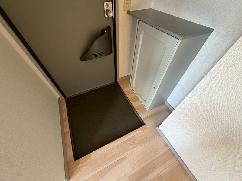 ファミールぼだいじ 玄関