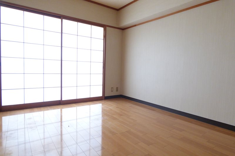 マンションつつみ ベッドルーム