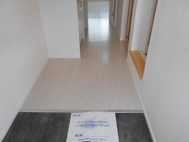 カインドネス京王堀之内 玄関
